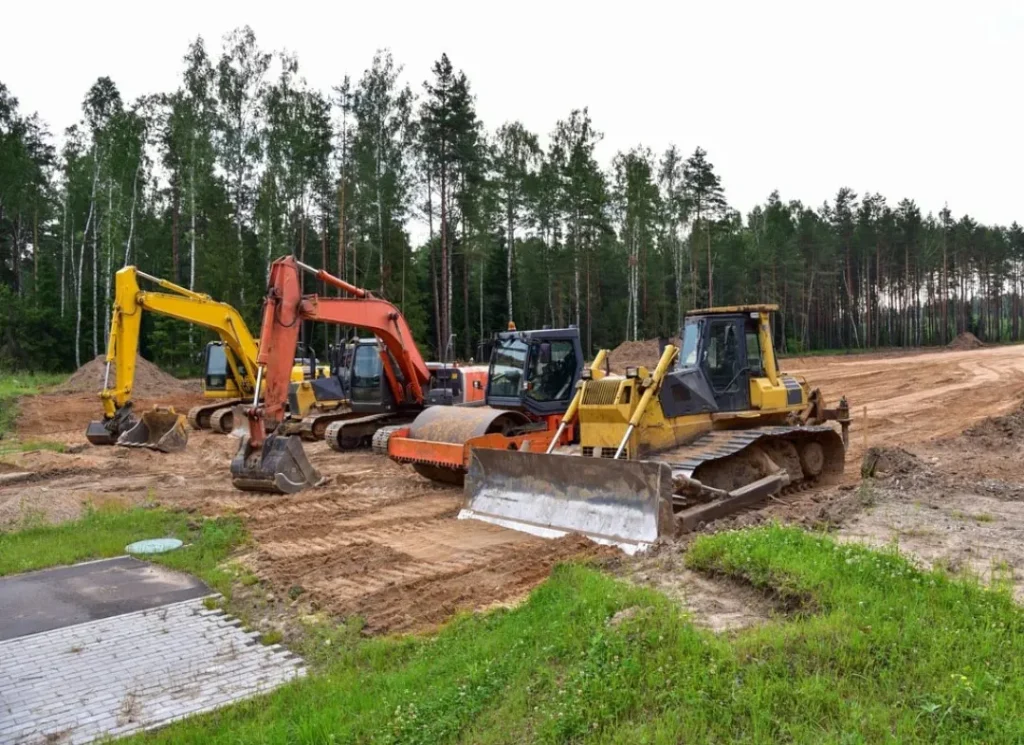 Heavy construction machinery onsite.